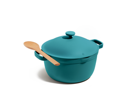 The Perfect Pot in teal, featuring an 8-in-1 nonstick design with lid and side handles, is pictured on a white background with a wooden spoon resting on top.