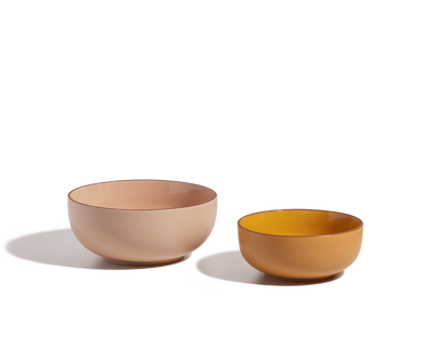 Two Serving Bowls—one large in beige, one small in mustard yellow—sit side by side on a white background. Ideal as stackable tableware for serving salads or snacks.