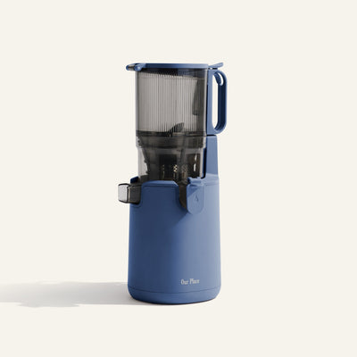 Blue juicer on a white background