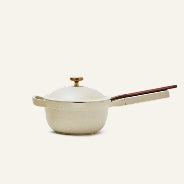 The Ceramic Nonstick Perfect Pot 2.75 qt., shown in beige with a lid and a long handle, is photographed against a plain light background.